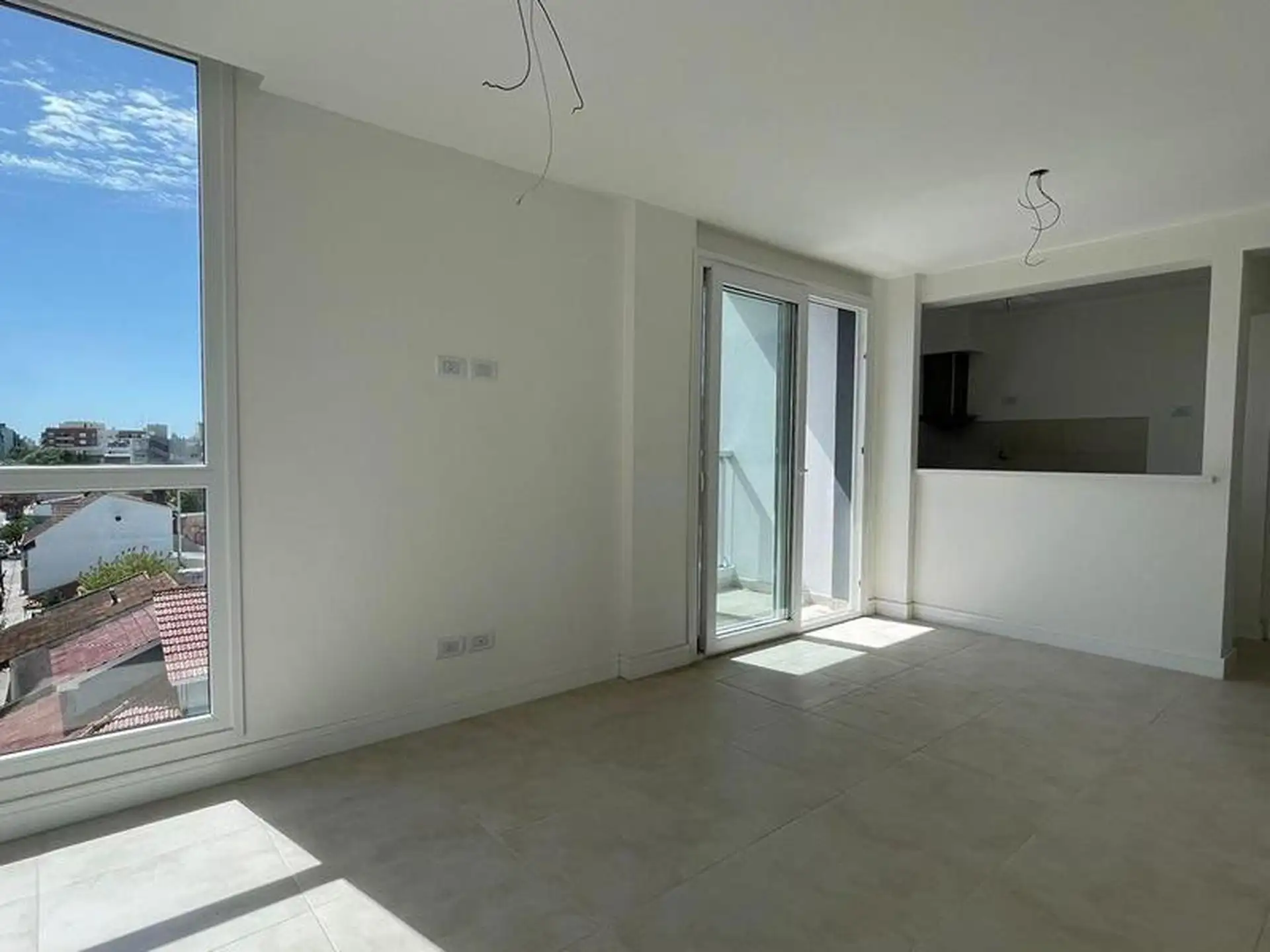 Departamento de dos ambientes con balcon y cochera a estrenar