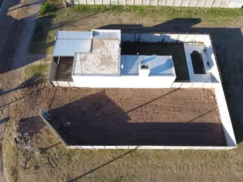 SE VENDE TERRENO Y SE RECIBE VEHICULOS Y CUOTAS 