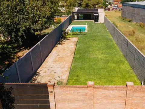  TERRENO CON MEJORAS EN VENTA EN BURZACO