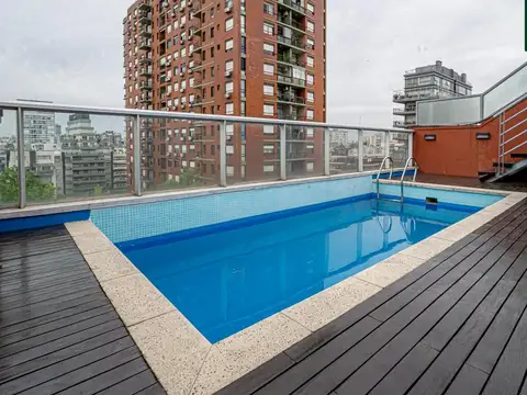 2 ambiente al frente con balcón, pileta, SUM, parrilla