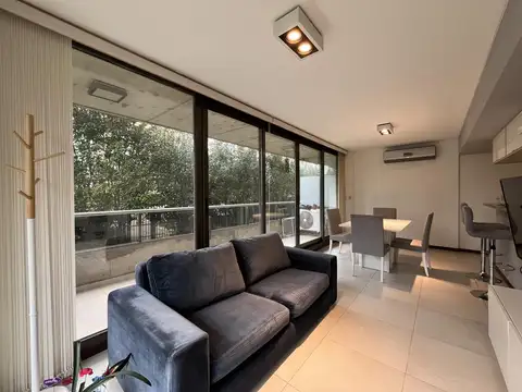 Condominios del alto III: departamento amueblado de dos dormitorios con cochera en alquiler