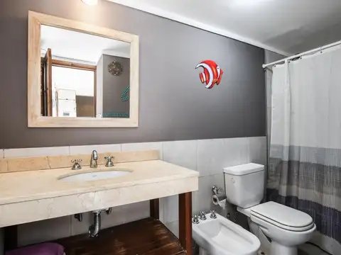 Casa de pasillo a la venta con patio dos dormitorios