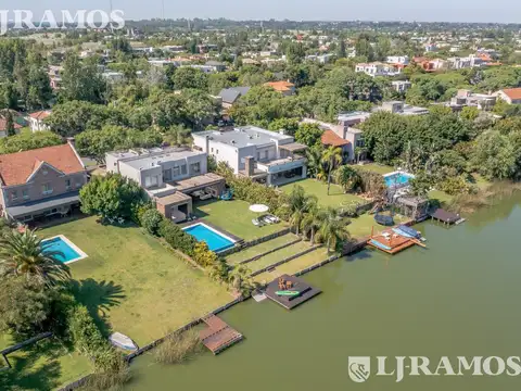 Casa a  la laguna, con 4 dormitorios, escritorio y play, en venta o alquiler en Santa Barbara