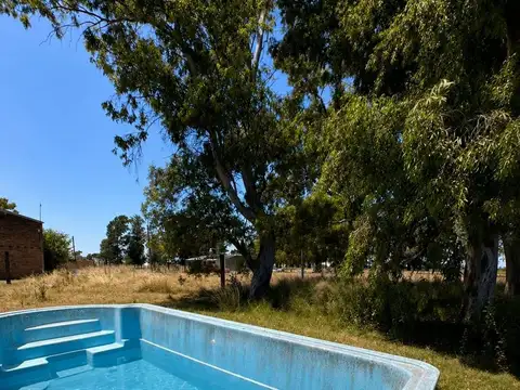Lote en venta en Alejandro Korn con pileta.