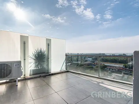 Increible Departamento con balcón terraza, increibla vista al rio y cochera fija.