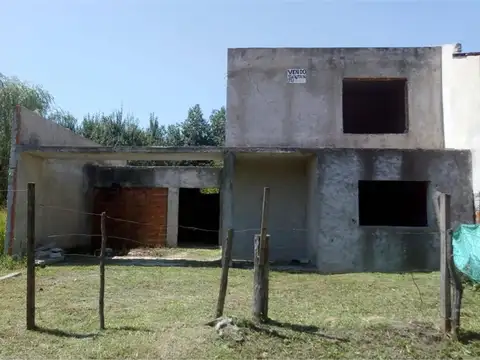 VENTA LOTE CON CONSTRUCION 