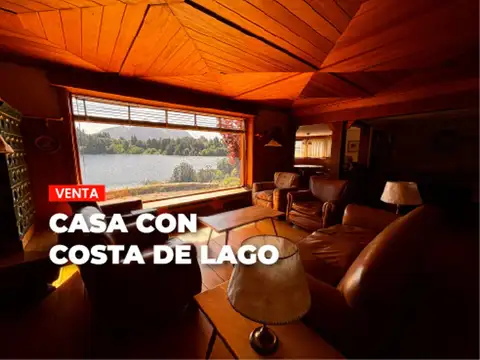 CASA EXCLUSIVA CON COSTA SOBRE LAGO MORENO