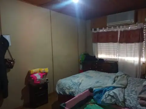 CASA EN MELINCUE. A PASOS DE LA TERMINAL DE COLECTIVOS. DOS DORMITORIOS. ALQUILADO