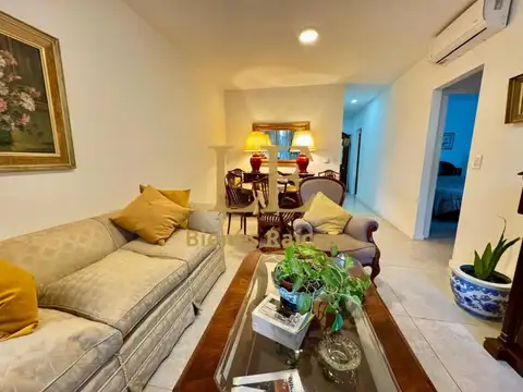 Venta departamento 3 ambientes con jardín y cochera