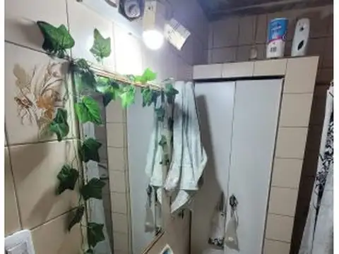 Casa 2 ambientes con 2 baños