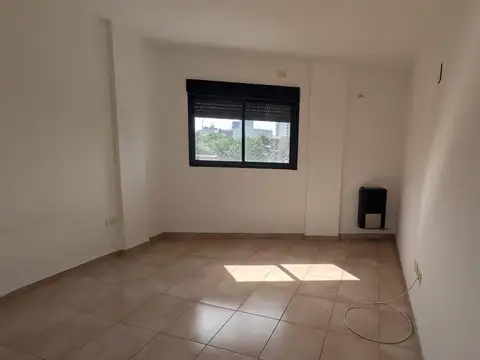 Departamento dos ambientes con cochera semi cubierta