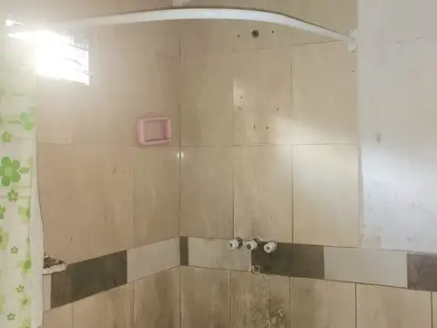 VENTA CASA 2 DORMITORIOS UNQUILLO A REMODELAR