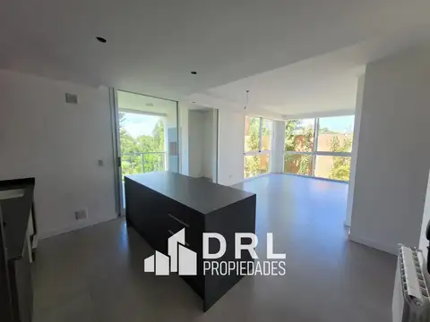 Departamento con salida a jardín en complejo La Rosella