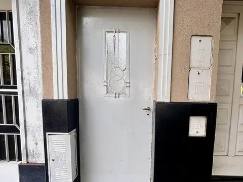 Casa de pasillo unico de 2 dormitorios en Rosario