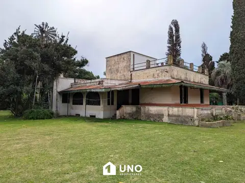 Santa Fe y San Martín - Casa de 3/4 Dormitorios. 