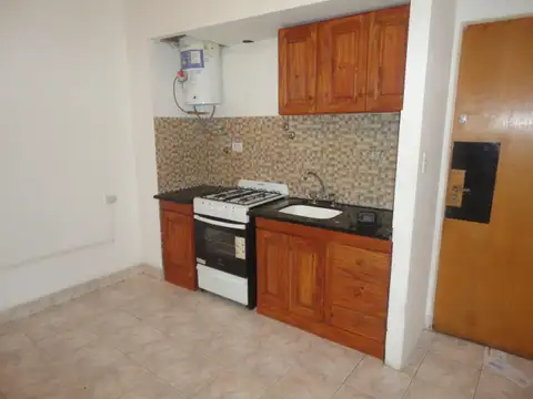 DEPARTAMENTO DE  2 AMBIENTES  PLANTA BAJA CON PATIO.