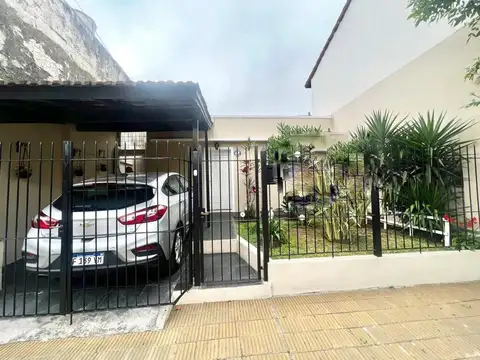 Casa americana en buen estado y ubicación