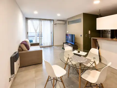 VENTA DEPARTAMENTO CON PATIO EN ABASTO DE 2 DOMITORIOS
