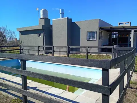 FINANCIA casa EXCELENTE estado a 400 Mts LAGO Potrero de Garay