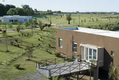 Áreas comunes piscina en el Barrio cerrado, Los Juncos