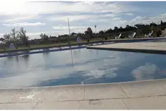 Áreas comunes juegos, club-house, piscina en el Barrio cerrado, Costaverde Barrio Privado