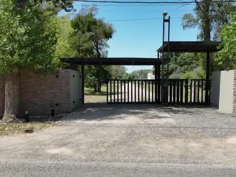 Lote en venta en Villa Elisa Barrio cerrado Los Ciruelos