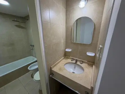 Departamento de 2 dormitorios y cochera en alquiler