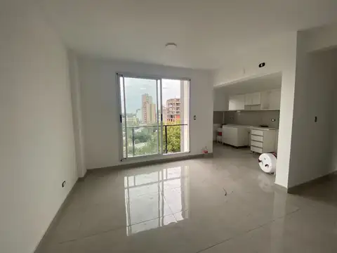 3 ambientes en edificio, con cochera