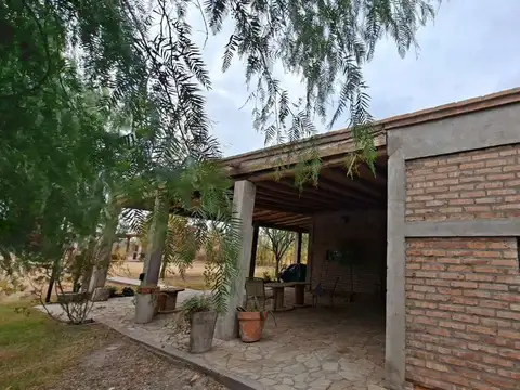 CASA, PISCINA Y QUINCHO EN TERRENO DE 2 HECTAREAS