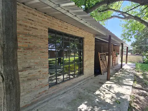 Chacra con mejoras y arboleda en Chenaut