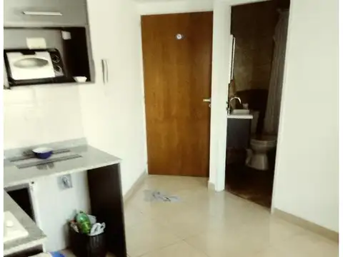 1 AMB en "L" con placard, aire. Balcon - COCHERA FIJA