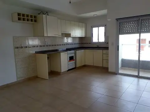 Departamento dos ambientes con balcon en segundo piso