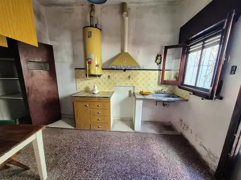VENTA DEPARTAMENTO TIPO CASA DE TRES AMBIENTES EN WILDE