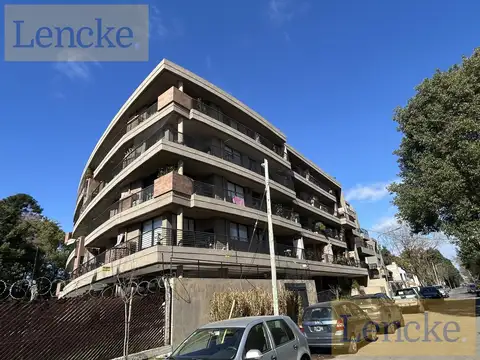 Departamento de 2 ambientes con cochera, terraza c/parrilla, edificio con amenities