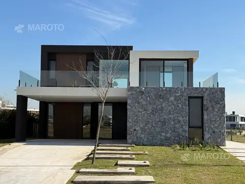 Casa a estrenar frente a la laguna en alquiler anual en Puertos - Costas