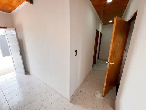 Amplia casa con jardin