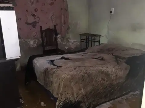 Casa en venta con detalles a refaccionar