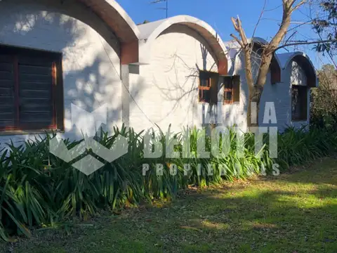 Cno. Belgrano e/ 404 y 405