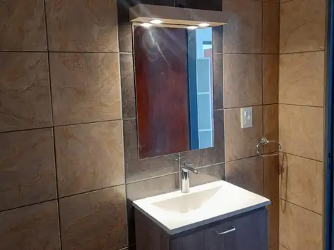 Casa 2 ambientes con 2 baños