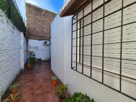 CASA PASILLO  TRES  DORMITORIOS  SERVANDO BAYO 1100  BARRIO ECHESORTU ROSARIO