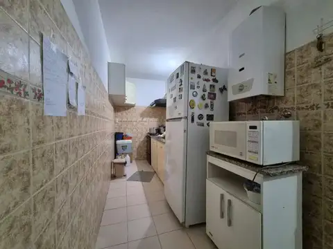 CASA PASILLO  TRES  DORMITORIOS  SERVANDO BAYO 1100  BARRIO ECHESORTU ROSARIO