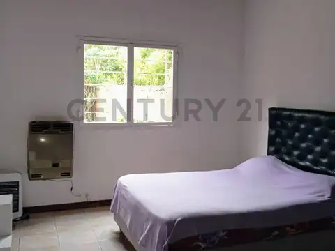 153 Y 58. CASA EN VENTA 2 DORMITORIOS, LOS HORNOS.