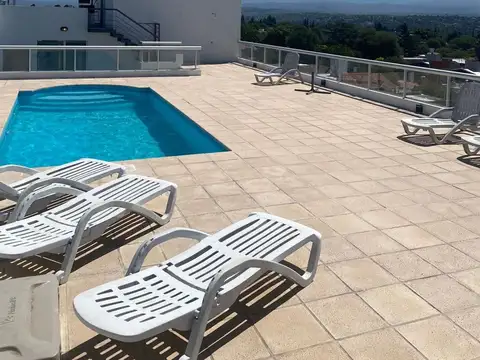 VENTA DPTO 1 DORM. PILETA. CENTRO CARLOS PAZ CBA