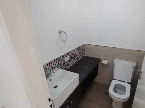 Tipo Casa 3 Ambientes Entrada independiente a Estrenar con dos Baños, Patio y Parrilla