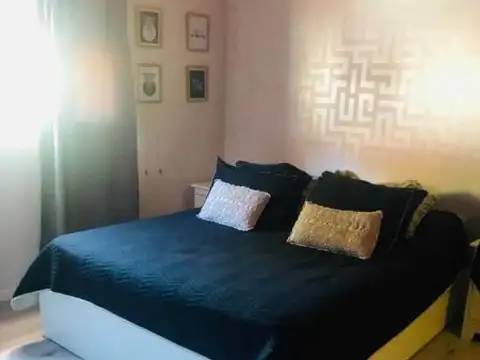 CASA 4 AMBIENTES CON COCHERA