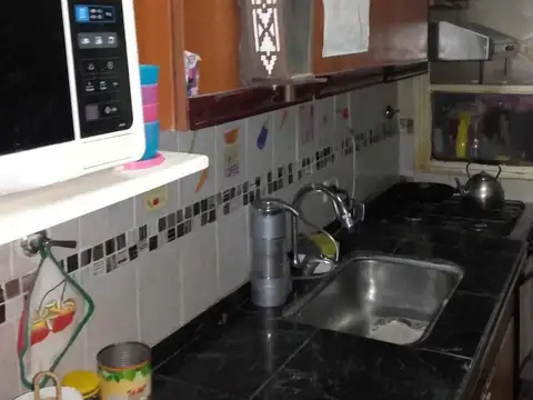 MUY BUEN DEPARTAMENTO 4 AMBIENTES CON COCHERA FRENTE AL CLUB BANCO HIPOTECARIO