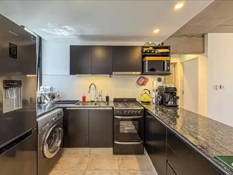 VENTA Departamento de 2 Dormitorios más terraza de uso exclusivo con cochera. Pichincha, Rosario