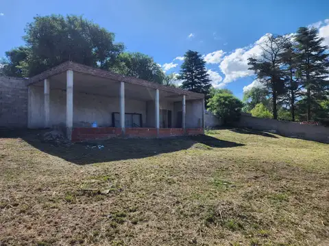 Lote con mejora a la venta en Bialet Masse. (L402)
