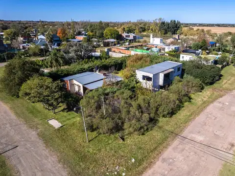 VENTA - CASA A TERMINAR DE 190M2 CONSTRUIDOS Y 330M2 DE LOTE - BARRIO BOSQUE AZUL ROLDAN