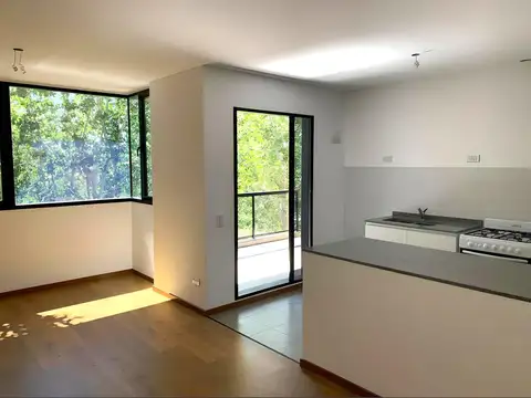VENTA - DEPARTAMENTO DOS DORMITORIOS CON COCHERA Y PARRILLERO - FISHERTON